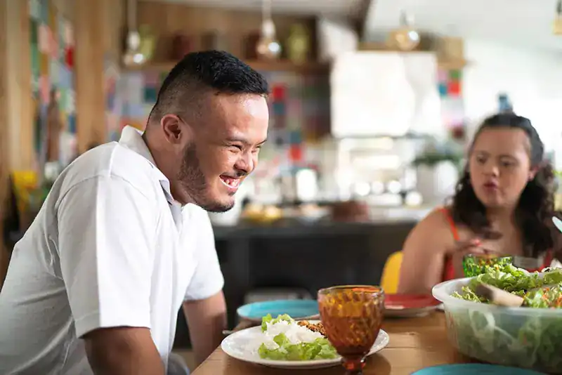 Empowering Weight Loss: A Comprehensive Guide for Individuals with Disabilities 2 Image of a disabled man and balance around nutrition to aid weight loss Cranleigh