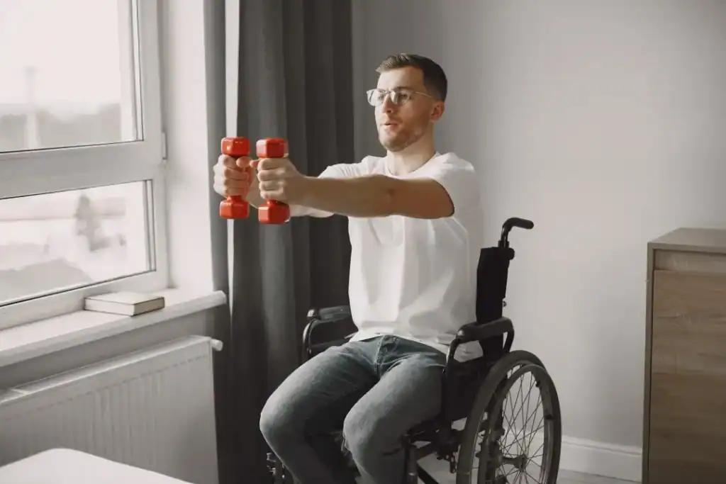 Image of man doing exercise in his wheelchair to aid weight loss Cranleigh