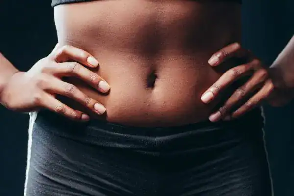 Toning Your Stomach: The Ultimate Guide to Achieving a Sculpted Stomach While Shedding Pounds 1 Image of a toned stomach after non surgical treatment Cranleigh